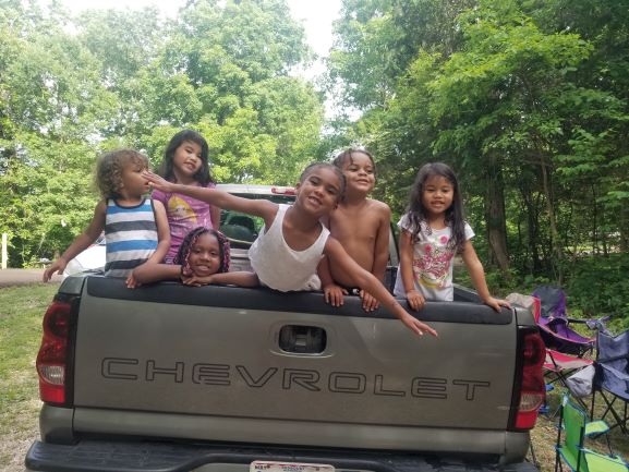 children on a truck