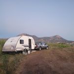 RV with mountains in the background - boondocking