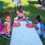 kids at a table eating