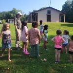 kids listening to a park naturalist