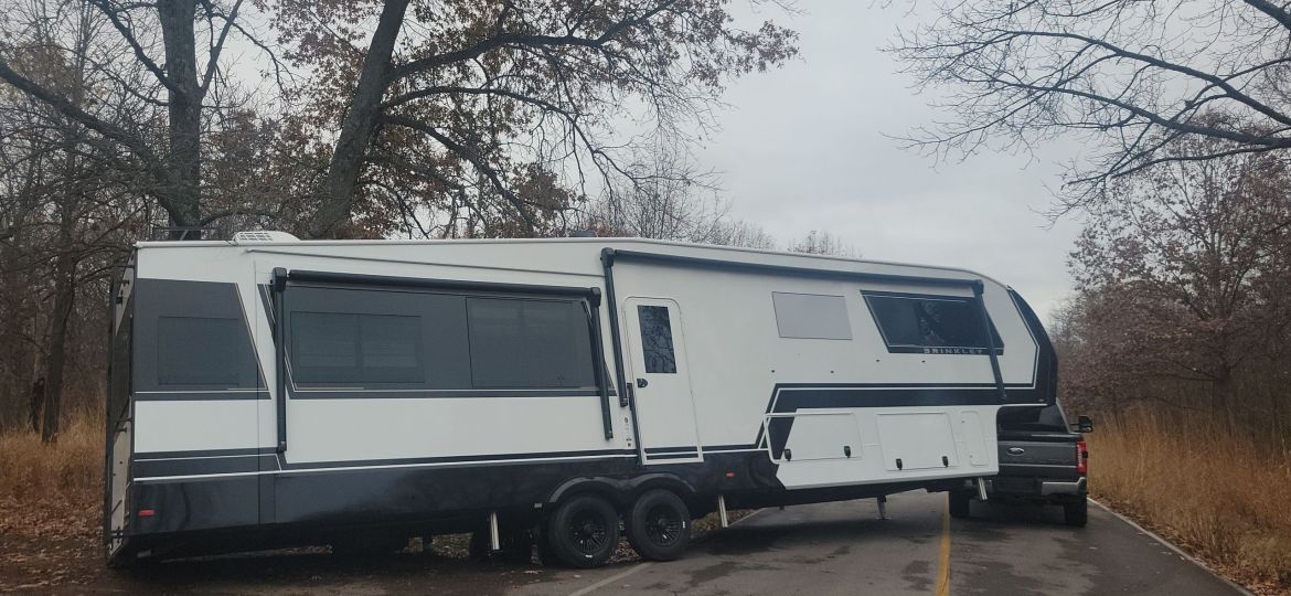 RV tilted after taking a turn to sharp, wheel went off the road